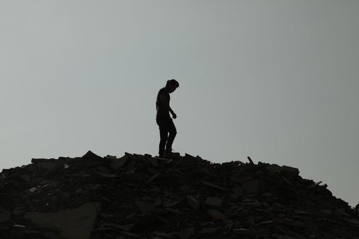 Silhouette of people on hill