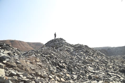 Silhouette of people on hill