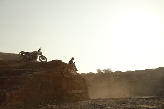 Silhouette of people on hill