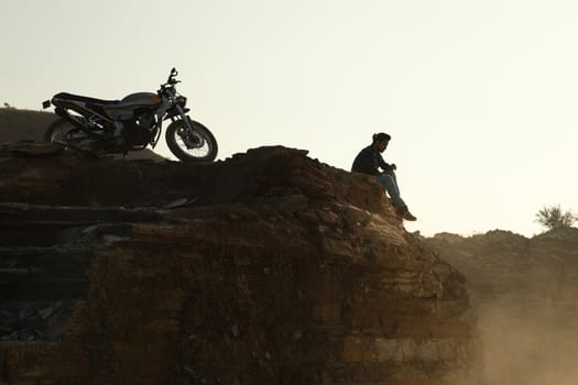 Silhouette of people on hill