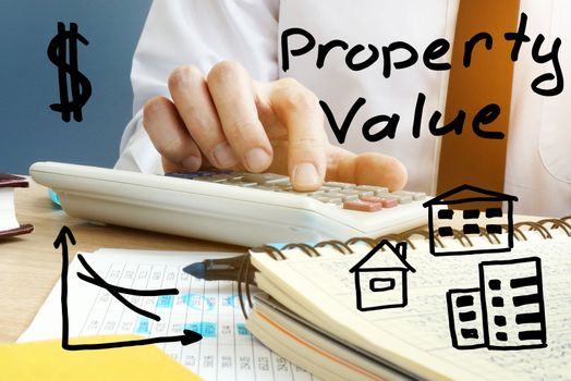 Property Value. Manager using calculator. Real Estate Investment.