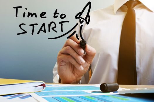 Time to start. Businessman at the table. New business or Start up concept.