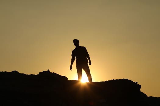 Silhouette of people on hill