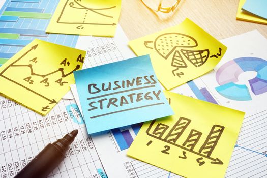 Business strategy and financial graphs and charts.