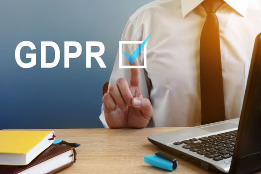 The General Data Protection Regulation GDPR. Man is pressing the button.