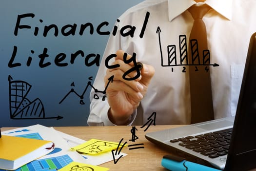 Financial Literacy. Man at the office table.