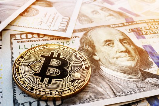 Bitcoin and dollar bills. Cryptocurrency trading and exchange.