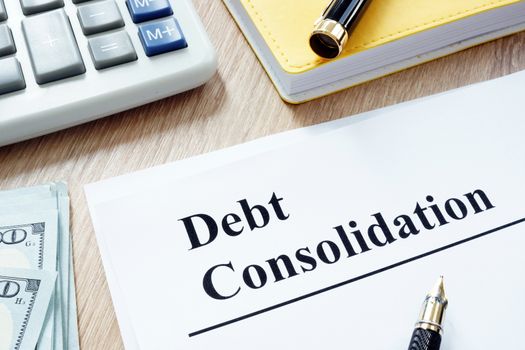 Debt consolidation form and calculator and money.