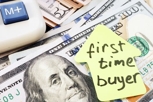 First time buyer written on a piece of paper. Real estate.