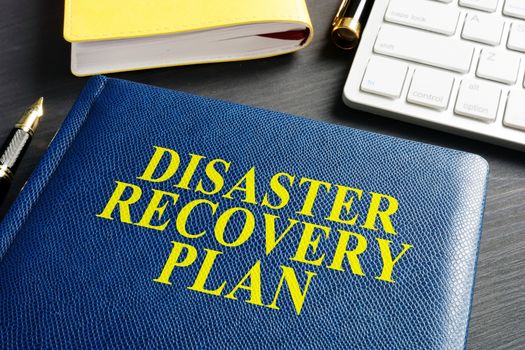 Disaster Recovery Plan on an office table.