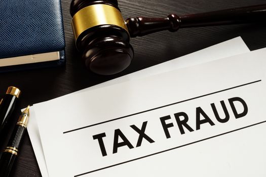 Documents about tax fraud in a court.