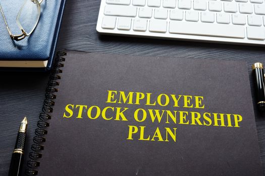 Employee Stock Ownership Plan (ESOP) on a desk.