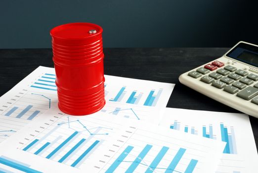 Oil trading concept. Barrel and exchange data with financial reports.