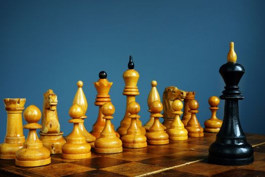 Business challenge and competitive strategy concept. King in front of other chess.