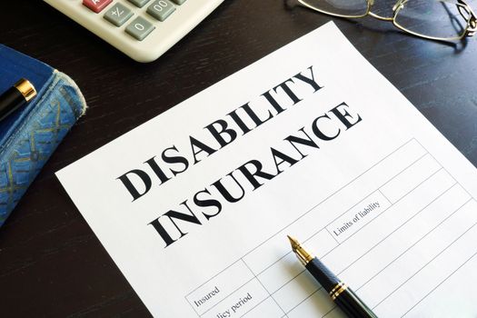 Disability Insurance on a table.