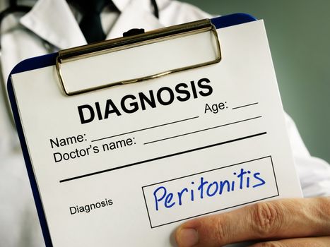 Peritonitis diagnosis. Doctor holds medical documents.