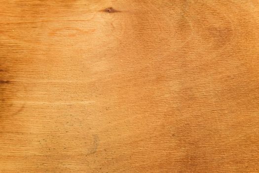 The background texture of the wood plywood is old yellowed.