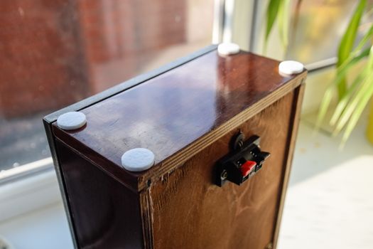 The back of the speakers. Terminals for attaching speaker wires to the speaker. Column speaker 15AS-208. Vintage Soviet bookshelf acoustics.
