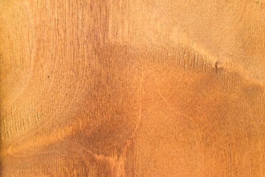 The background texture of the wood plywood is old yellowed.