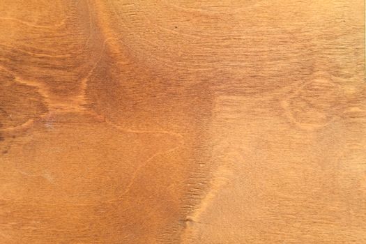 The background texture of the wood plywood is old yellowed.