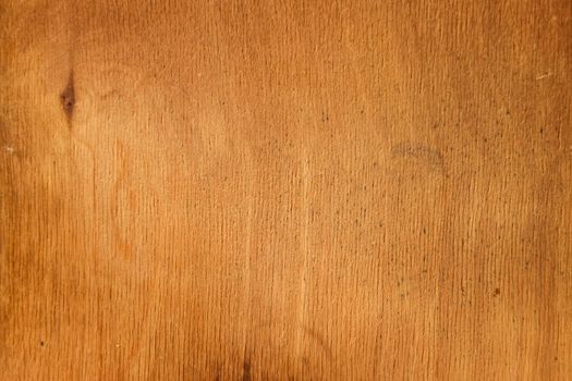 The background texture of the wood plywood is old yellowed.