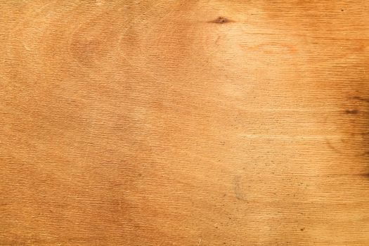 The background texture of the wood plywood is old yellowed.