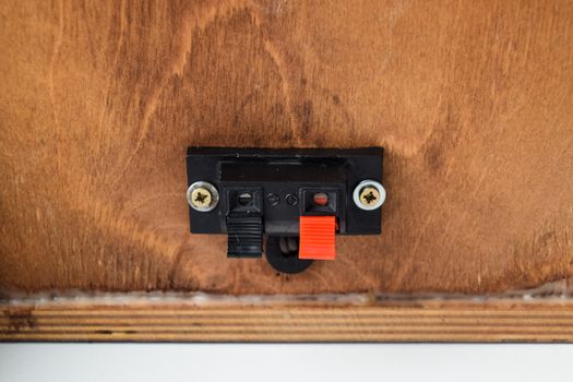 The back of the speakers. Terminals for attaching speaker wires to the speaker. Column speaker 15AS-208. Vintage Soviet bookshelf acoustics.