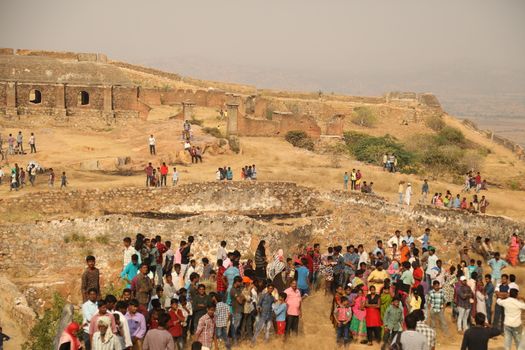Silhouette of people on hill