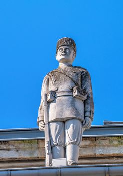 Ruse, Bulgaria - 07.26.2019. Sculpture on the roof of an old historical building in Ruse, Bulgaria, on a sunny summer day