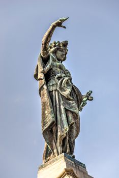 Ruse, Bulgaria - 07.26.2019. Sculpture of Liberty at the top of the monument in the city of Ruse, Bulgaria, on a sunny summer day