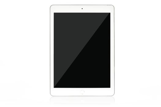 Mockup of a modern white and silver digital tablet isolated on a white background