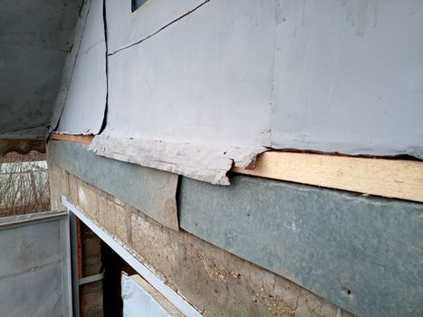 Repair of the pediment of the house. Steel pediment on the garage. Roof repair.