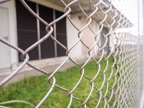 Wire fencing beside each other, the line between the road