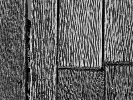 Grooves and patterns of the hardwood bridge across the canal