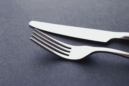 Fork and knife, silver cutlery for table decor, minimalistic design and diet concept