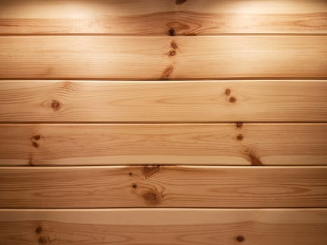 Beautiful wooden background - natural spruce planks with two backlights illuminated from above as a texture (high details).