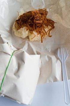 Sticky rice and Roast pork in paper wrap