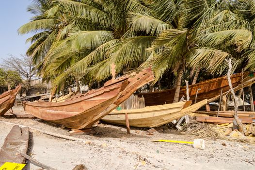 Construction of traditional boat in Banjul, capital of The Gambia, West Africa