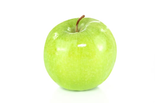 Green apple isolated on white background in close-up