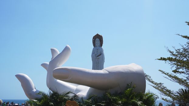 White GuanYin statue in Nanshan Buddhist Cultural Park, Sanya, Hainan Island, China.