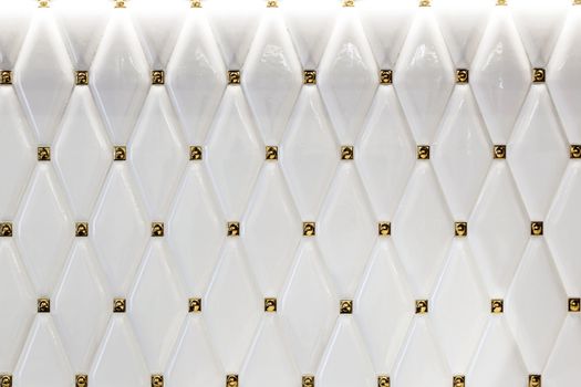 Modern decorative white tile closeup. Decorative background with white tiles on the wall.