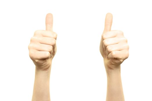 Woman is holding two thumbs up into the air on a white background