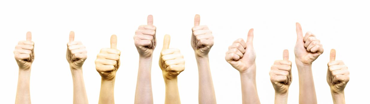 Group of young people showing thumbs up gesture on a white background