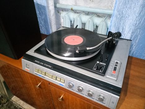 Krasnodar, Russia - March 31, 2020: Vintage soviet electrophone Vega 109 stereo. Turntable vinyl, old equipment.