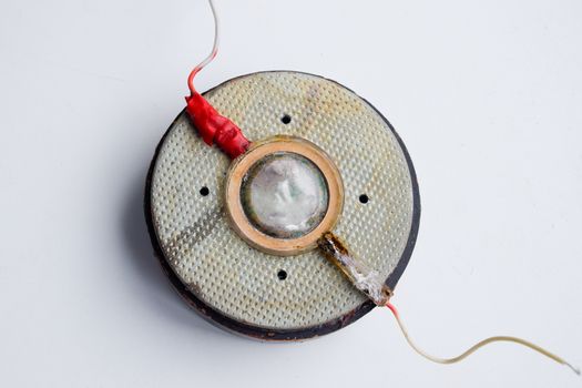 Speaker repair, disassembled speaker. High-frequency speaker 6GDV-7-16 on a white background. A component of a three-way speaker system.