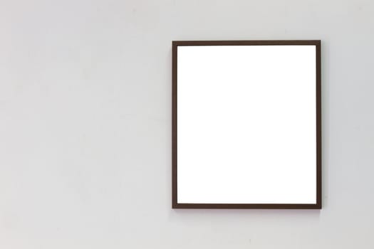 horizontal photo of photo frame on blank wall background, copyspace.
