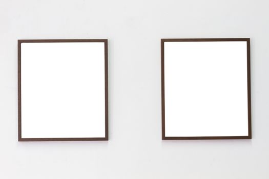 horizontal photo of two photo frame on blank wall background, copyspace.