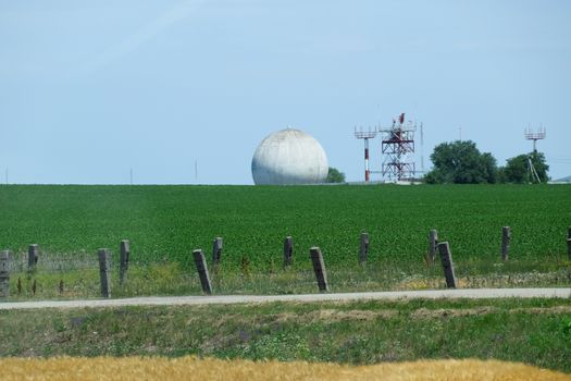 a Military radio station, round building of radar antenna.