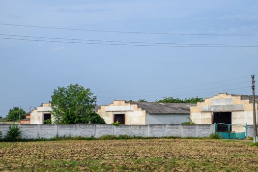 Old Soviet hangars for storing machinery and agricultural raw materials