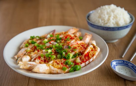 steam prawn with garlic and chilli on wooden background